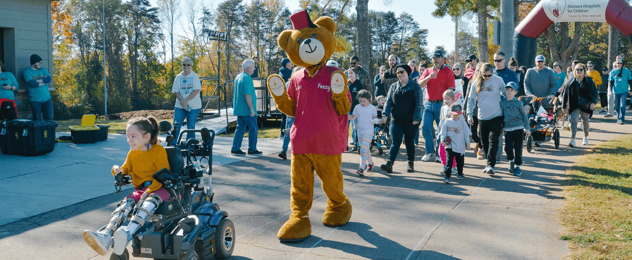 Shriners mascot Fezzy participates in a walk for love event