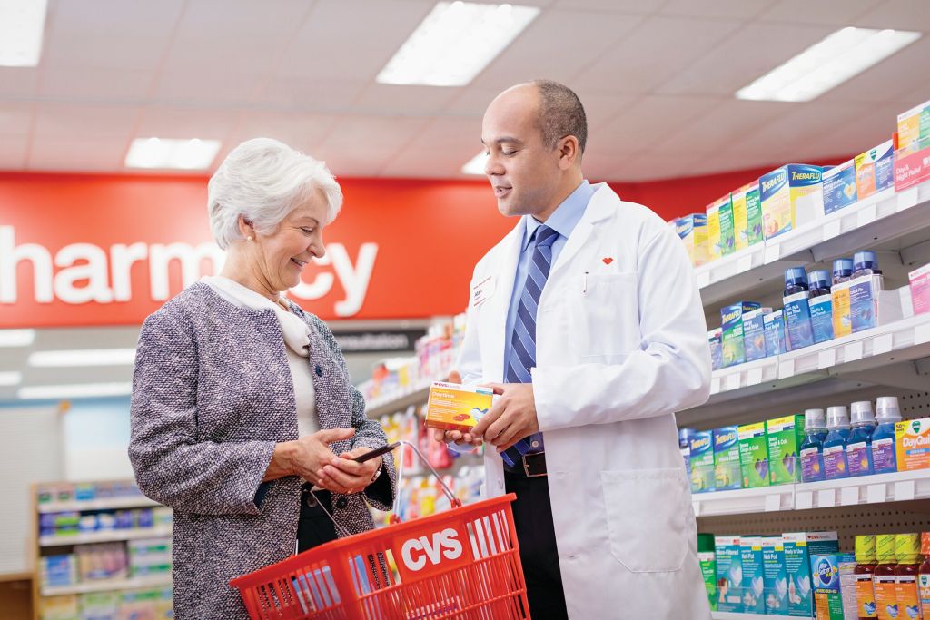 CVS Pharmacy pharmacist-assisting-customer