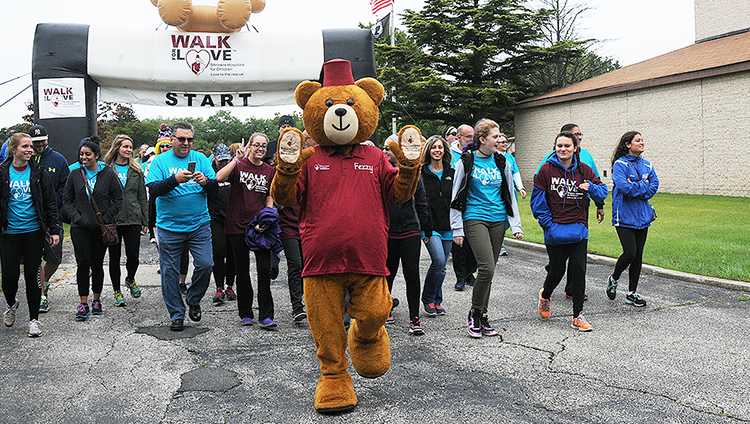Shriners mascot Fezzy participates in a walk for love event