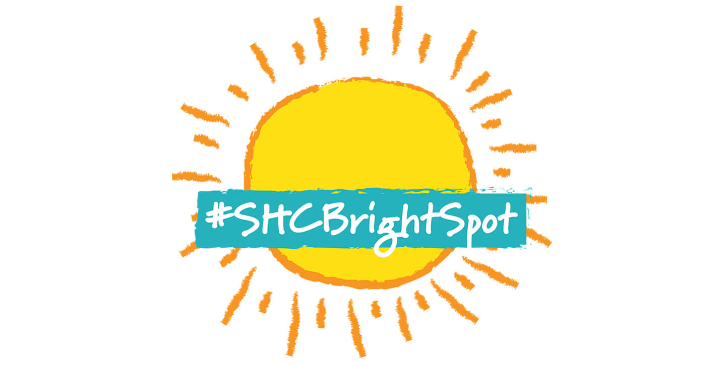#SHCBrightSpot super-imposed over a yellow sun illustration